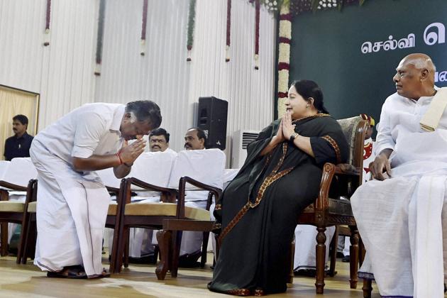 O Panneerselvam greeting AIADMK supremo J Jayalalithaa ahead of taking the oath of secrecy as Finance Minister at the swearing in ceremony at Madras University Centenary Auditorium in Chennai on 23 May 2016.(R Senthil Kumar/PTI)