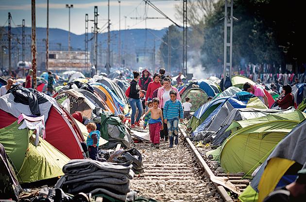 Refugees at the Idomeni camp on the Greek Macedonia border on March 11, 2016(Matt Cardy/Getty Images) Refugees at the Idomeni camp on the Greek Macedonia border on March 11, 2016(Matt Cardy/Getty Images)