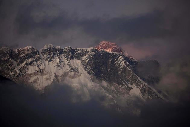 File photo of the sun setting on Mount Everest.(AP) File photo of the sun setting on Mount Everest.(AP)