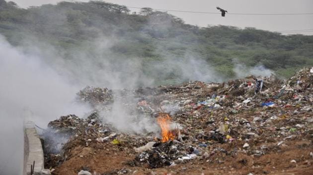 Smoke billowing out of the dumping in Sector 23, Panchkula, on Wednesday.(Sant Arora/HT Photo)