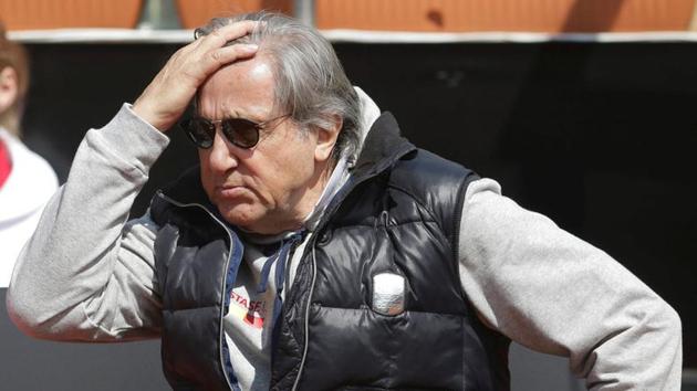 Romania's head coach Ilie Nastase reacts while watching the Fed Cup Group II play-off match between Romania and Great Britain. (REUTERS) Romania's head coach Ilie Nastase reacts while watching the Fed Cup Group II play-off match between Romania and Great Britain. (REUTERS)