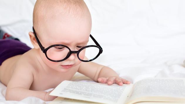 Children whose parents have conversations with their children about the book while reading, such as labelling the pictures or the emotions of the characters in the book are more likely to have early reading skills as well as literacy skills.(Shutterstock) Children whose parents have conversations with their children about the book while reading, such as labelling the pictures or the emotions of the characters in the book are more likely to have early reading skills as well as literacy skills.(Shutterstock)