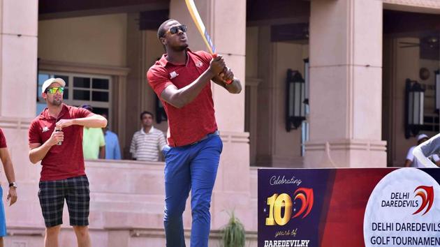 And then, Carlos Brathwaite got into driving the ball, but with something more familiar in hand, the cricket bat instead of the golf club, during the Delhi Daredevils golf tournament. (delhi daredevils) 