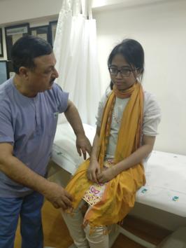 Doctors at a Delhi hospital made 23-year-old Bangladeshi girl, Promi Khisa, walk after nearly two years(HT photo)