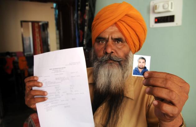 Father of Hardeep Singh said his son was picked up from their home at 8 in the morning but the police FIR claims he was detained at a police picket after heroin was found on him. (Anil Dayal/HT) Father of Hardeep Singh said his son was picked up from their home at 8 in the morning but the police FIR claims he was detained at a police picket after heroin was found on him. (Anil Dayal/HT)