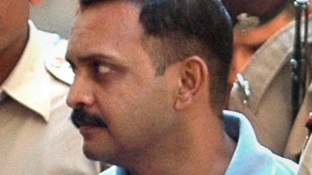 Malegaon blast case accused Lt Col Shrikant Prasad Purohit being taken to a session court in Mumbai.(PTI File)