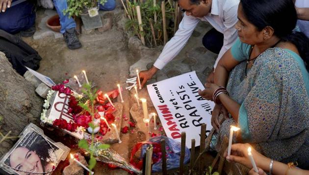 Parents of Nirbhaya Asha Devi and BN Singh light candles at a memorial at Jantar Mantar in New Delhi on Friday. (PTI Photo) Parents of Nirbhaya Asha Devi and BN Singh light candles at a memorial at Jantar Mantar in New Delhi on Friday. (PTI Photo)