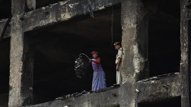 On April 19, six people, including a visitor and a managing director of a factory in Noida that was operating in violation of building bylaws and land-use norms, died in a fire.(Virendra Singh Gosain/HT Photo) On April 19, six people, including a visitor and a managing director of a factory in Noida that was operating in violation of building bylaws and land-use norms, died in a fire.(Virendra Singh Gosain/HT Photo)