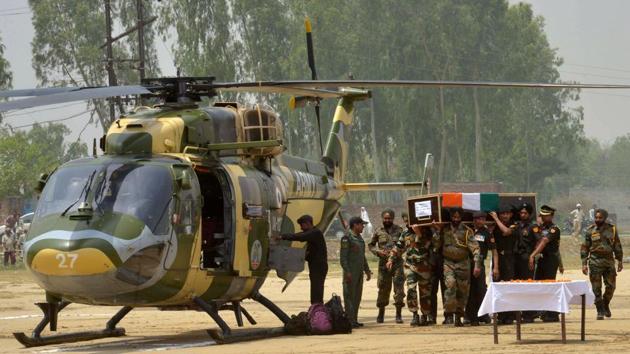 Indian Army personnel carry the coffin of Indian Army soldier Paramjeet Singh ahead of his funeral at Vein Pein village, some 45km from Amritsar on May 2, 2017. The Indian army accused Pakistan of killing two of its soldiers and mutilating their bodies in an "unprovoked" rocket and mortar attack along the tense border which separates the two countries. (AFP) Indian Army personnel carry the coffin of Indian Army soldier Paramjeet Singh ahead of his funeral at Vein Pein village, some 45km from Amritsar on May 2, 2017. The Indian army accused Pakistan of killing two of its soldiers and mutilating their bodies in an "unprovoked" rocket and mortar attack along the tense border which separates the two countries. (AFP)