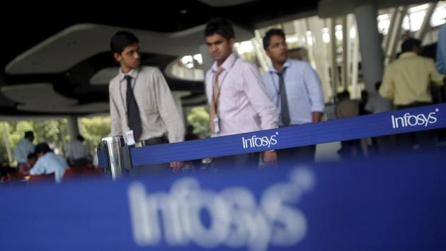 Employees of Indian software company Infosys at their campus in Electronic City, Bengaluru. The past few months have seen some of the biggest names in technology, ranging from Microsoft, Cisco, Infosys and Flipkart take decisions to downsize their workforce.(REUTERS)