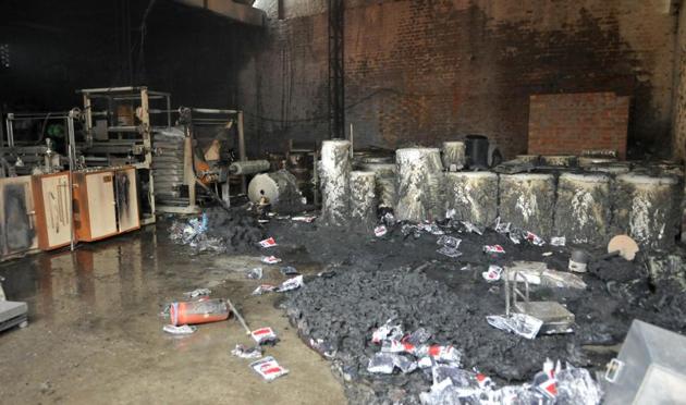 After the blaze at Ashok Plastics at Cheema Chowk in Ludhiana on Friday, May 5. Fire broke out at two factories and five godowns in the afternoon. Eight fire tenders were pressed into service. (Gurminder Singh/HT)