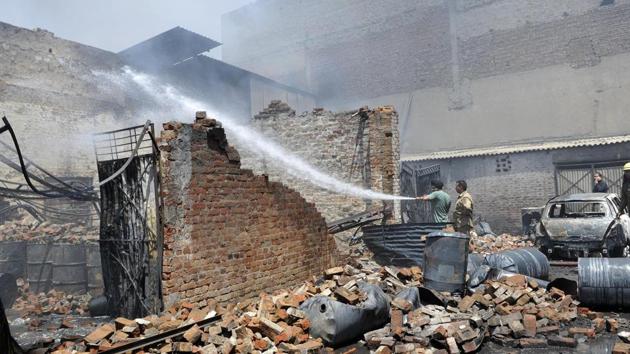 Firefighters at work at a plastic factory in Ludhiana on Friday, May 5. (Gurminder Singh/HT)