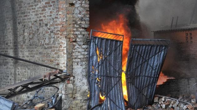 The blaze at Ashok Plastics at Cheema Chowk in Ludhiana on Friday, May 5. Fire broke out at two factories and five godowns in the afternoon. Eight fire tenders were pressed into service. (Gurminder Singh/HT)