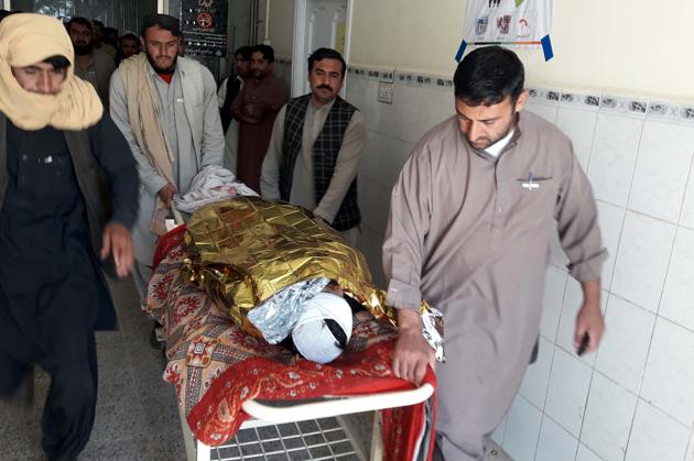 Relatives push a stretcher carrying the body of a victim of cross-border on Friday. (AFP) Relatives push a stretcher carrying the body of a victim of cross-border on Friday. (AFP)