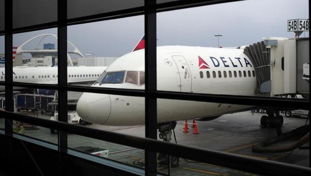 A California couple claimed they were kicked off an overbooked Delta flight for refusing to give up their child's seat. (AFP) A California couple claimed they were kicked off an overbooked Delta flight for refusing to give up their child's seat. (AFP)