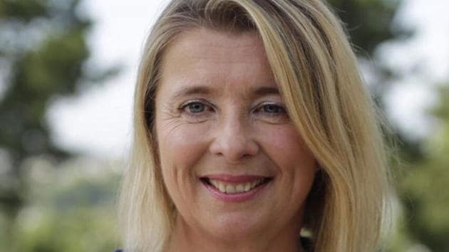 Corinne Erhel, 50, was the last to speak at the rally Friday in western France when she suddenly fell to the ground. She was rushed to hospital, where she was pronounced dead.(Twitter Photo) Corinne Erhel, 50, was the last to speak at the rally Friday in western France when she suddenly fell to the ground. She was rushed to hospital, where she was pronounced dead.(Twitter Photo)