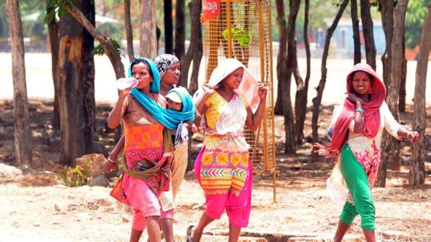 According to the state labour department, at least five million daily wagers across Jharkhand travel from rural areas to cities in search of work everyday (Diwakar Prasad/HT Photo) According to the state labour department, at least five million daily wagers across Jharkhand travel from rural areas to cities in search of work everyday (Diwakar Prasad/HT Photo)