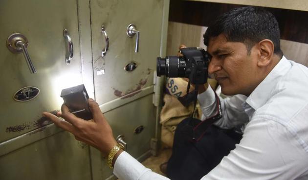 Sanket Rathod, police photographer of the Mumbai police on assignment(Pratham Gokhale / HT Photo)