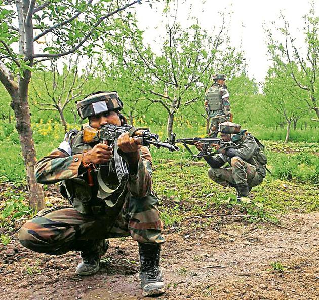 Soldiers during an operation against militants in Shopian district in Jammu and Kashmir on Friday. Thousands of army and paramilitary personnel are engaged in a huge anti-militant operation in Kashmir, where armed militants have repeatedly attacked security forces in recent weeks. (Waseem Andrabi /HT) Soldiers during an operation against militants in Shopian district in Jammu and Kashmir on Friday. Thousands of army and paramilitary personnel are engaged in a huge anti-militant operation in Kashmir, where armed militants have repeatedly attacked security forces in recent weeks. (Waseem Andrabi /HT)