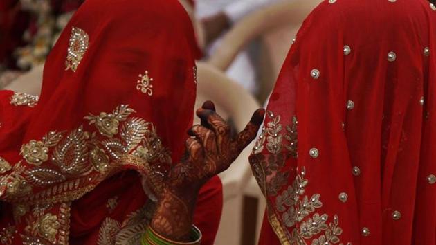 Muslim brides talk to each other before a mass wedding event in Ahmadabad, in 2016. (AP) Muslim brides talk to each other before a mass wedding event in Ahmadabad, in 2016. (AP)