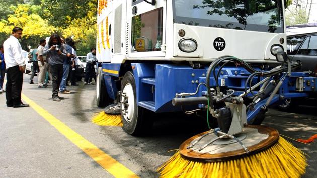 The machines with circular brooms and vacuuming mechanism are meant to make the roads dust-free. They will be used on roads that are 60-feet-wide and above.(Ajay Aggarwal/ HT file photo)