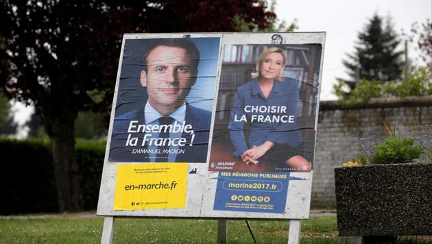 French presidential candidate Emmanuel Macron (left) has said his campaign has been the target of a computer hack.(REUTERS) French presidential candidate Emmanuel Macron (left) has said his campaign has been the target of a computer hack.(REUTERS)