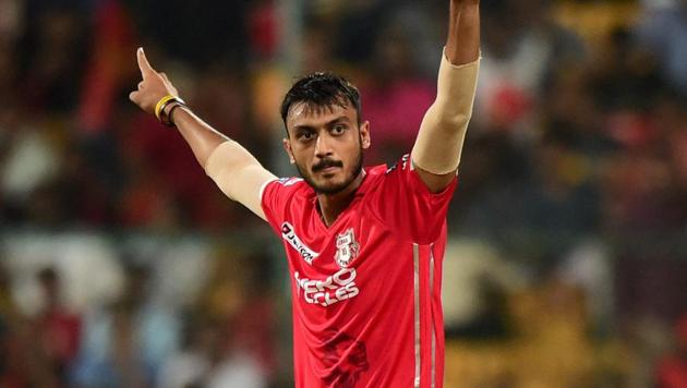 King's XI Punjab’s Axar Patel celebrates the wicket of Samuel Badree during the IPL 2017 match against Royal Challengers Bangalore at the Chinnaswamy Stadium in Bengaluru on Friday. (PTI) King's XI Punjab’s Axar Patel celebrates the wicket of Samuel Badree during the IPL 2017 match against Royal Challengers Bangalore at the Chinnaswamy Stadium in Bengaluru on Friday. (PTI)