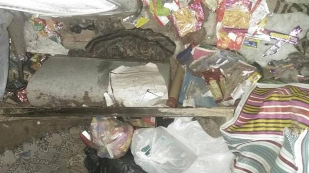 Police rescue a teenage girl from a locked room strewn with garbage in East Delhi’s Mandawali. (HT Photo) Police rescue a teenage girl from a locked room strewn with garbage in East Delhi’s Mandawali. (HT Photo)