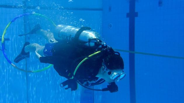There was an introductory session in scuba diving for beginners in a 10-feet deep pool. (Kunal Patil/HT Photo) 