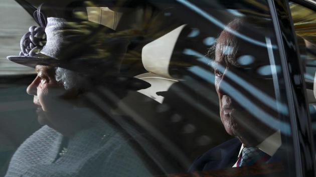 Britain's Prince Philip and Queen Elizabeth leave Buckingham Palace in London. Queen Elizabeth II’s husband, Prince Philip, will stop carrying out public engagements this fall, Buckingham Palace announced Thursday. (Neil Hall/REUTERS)