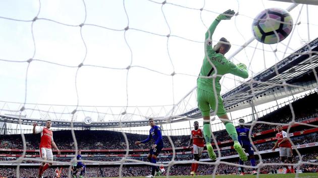 Arsenal Football Club's Danny Welbeck scores his side's second goal during the English Premier League match against Manchester United F.C. at the Emirates Stadium on Sunday. (AP) Arsenal Football Club's Danny Welbeck scores his side's second goal during the English Premier League match against Manchester United F.C. at the Emirates Stadium on Sunday. (AP)