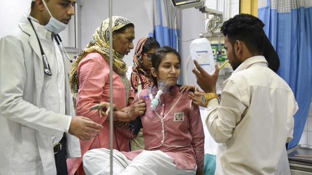 School students being bought to the Emergency ward of Hakeem Abdul Hameed Centenary Hospital. Several students were hospitalised after a gas leak at the container depot in Tughlakabad. (Saumya Khandelwal/HT Photo) School students being bought to the Emergency ward of Hakeem Abdul Hameed Centenary Hospital. Several students were hospitalised after a gas leak at the container depot in Tughlakabad. (Saumya Khandelwal/HT Photo)