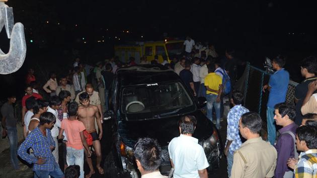 Officials suspect that the car was driven at around 80kmph and the driver probably lost control of the vehicle on the two-lane canal road. (Sakib Ali/HT Photo) Officials suspect that the car was driven at around 80kmph and the driver probably lost control of the vehicle on the two-lane canal road. (Sakib Ali/HT Photo)