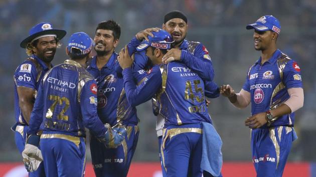 Mumbai Indians' team celebrate the dismissal of Delhi Daredevils' Marlon Samuels during their Indian Premier League (IPL) match in New Delhi on Saturday. (AP) Mumbai Indians' team celebrate the dismissal of Delhi Daredevils' Marlon Samuels during their Indian Premier League (IPL) match in New Delhi on Saturday. (AP)