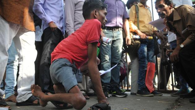 A physically challenged candidate reaches his exam centre. (Mujeeb Faruqui/HT Photo) A physically challenged candidate reaches his exam centre. (Mujeeb Faruqui/HT Photo)