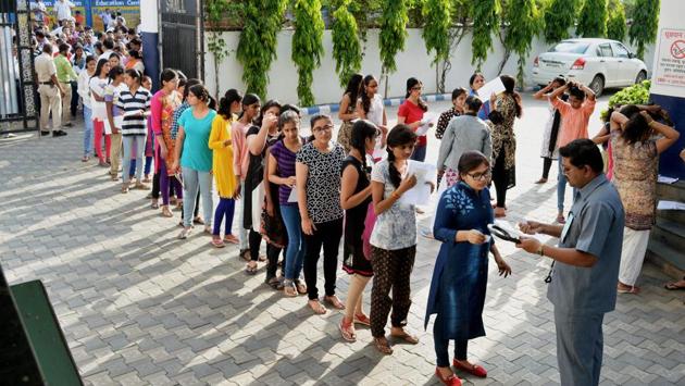 First slot was between 7:30 am and 8:30 am while second slot began at 8:30 am till 9:30 am. The exam started at 10 am. (PTI) First slot was between 7:30 am and 8:30 am while second slot began at 8:30 am till 9:30 am. The exam started at 10 am. (PTI)