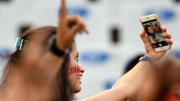 A cricket fane taking selfie during an IPL 2017 match between Kings X1 Punjab and Gujarat lions at PCA stadium in Mohali, Punjab, on Sunday. (Ravi Kumar/HT Photo) A cricket fane taking selfie during an IPL 2017 match between Kings X1 Punjab and Gujarat lions at PCA stadium in Mohali, Punjab, on Sunday. (Ravi Kumar/HT Photo)