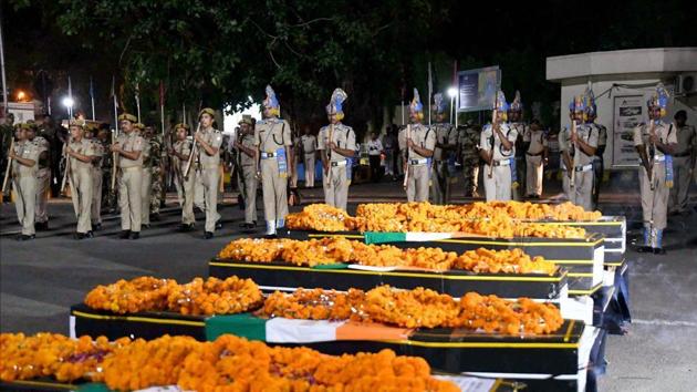 Jawans give gun salute to martyred CRPF personnel at Patna airport. (PTI File Photo) Jawans give gun salute to martyred CRPF personnel at Patna airport. (PTI File Photo)