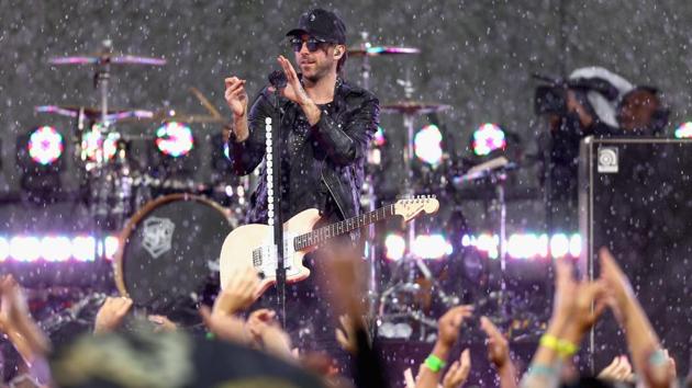 Singer Alex Gaskarth of All Time Low during his performance at The Shrine Auditorium on Sunday. (AFP) Singer Alex Gaskarth of All Time Low during his performance at The Shrine Auditorium on Sunday. (AFP)