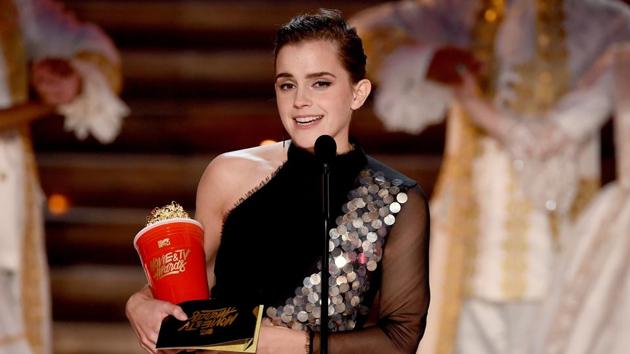 Actor Emma Watson accepts Best Actor in a Movie for Beauty and the Beast onstage during the 2017 MTV Movie And TV Awards.(AFP) Actor Emma Watson accepts Best Actor in a Movie for Beauty and the Beast onstage during the 2017 MTV Movie And TV Awards.(AFP)