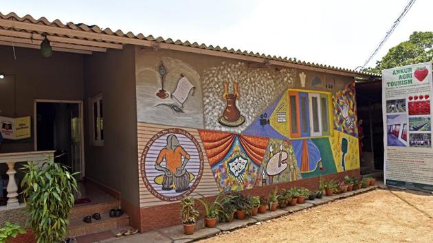 It’s hard to miss any home that has been transformed into a library for each home is painted in murals made to match the genre of books on offer within. This house, for instance, belongs to Ganpat Parathe and has books on culture and art. (Pratik chorge/ ht photo )