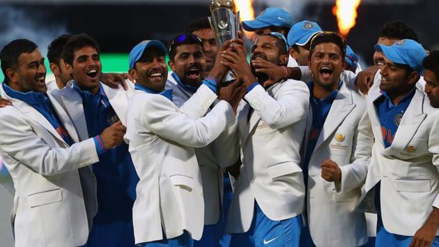 The Indian cricket team celebrates after its five-run victory against England in the ICC Champions Trophy final at Edgbaston on June 23, 2013 in Birmingham.(Getty Images)