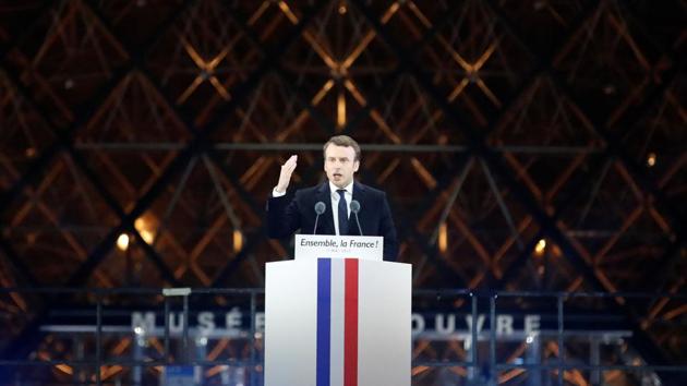 French President-elect Emmanuel Macron celebrates on the stage at his victory rally near the Louvre in Paris. (REUTERS) French President-elect Emmanuel Macron celebrates on the stage at his victory rally near the Louvre in Paris. (REUTERS)