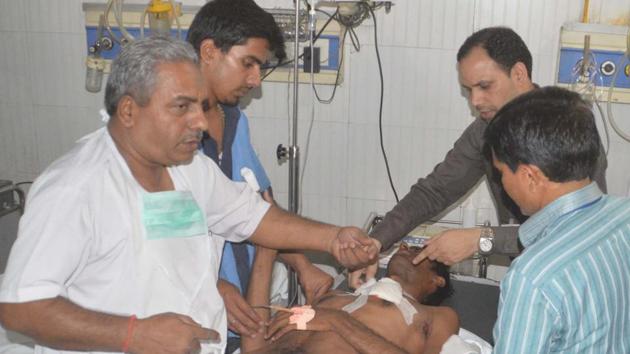 The victim, Ajit Kumar, was left on the roadside bleeding profusely from a bullet wound in the chest until a 25-year-old man stopped and took him to a nearby hospital. (HT Photo) The victim, Ajit Kumar, was left on the roadside bleeding profusely from a bullet wound in the chest until a 25-year-old man stopped and took him to a nearby hospital. (HT Photo)