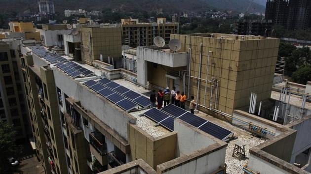 The solar panels atop Grace Co-operative Housing Society in Mulund that cost Rs18.5 lakh.(Praful Gangurde/HT)