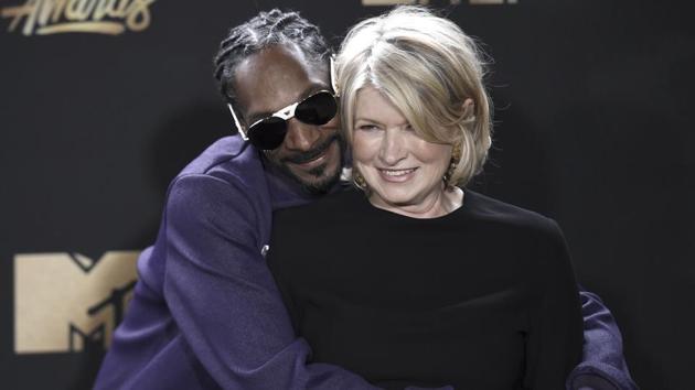 Snoop Dogg and Martha Stewart pose in the press room during the ceremony. (AP) Snoop Dogg and Martha Stewart pose in the press room during the ceremony. (AP)