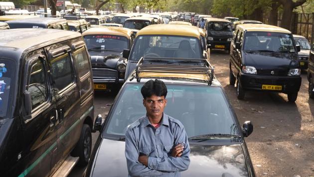 Driving a Kaali-Peeli (Black & Yellow) Maruti Esteem taxi around Delhi, Debendra says it never struck him to keep the lost bag for himself. (Ravi Choudhary/HT PHOTO)