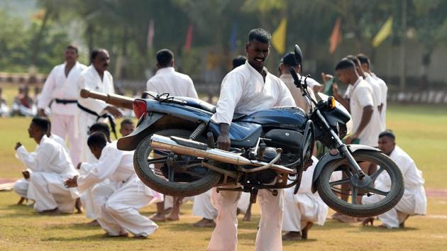 Members of the karate squad perform stunts. (Pratham Gokhale/HT Photo) 