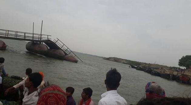 A portion of the pontoon bridge in Danapur, connecting Patna with north Bihar, was damaged during a thundersquall in Patna on Tuesday. (HT photo) A portion of the pontoon bridge in Danapur, connecting Patna with north Bihar, was damaged during a thundersquall in Patna on Tuesday. (HT photo)