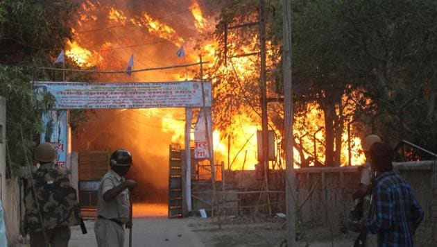A fire broke out after clashes between police and encroachers who were being evicted from Jawaharbagh in Mathura. (Anant Ram/HT File Photo) A fire broke out after clashes between police and encroachers who were being evicted from Jawaharbagh in Mathura. (Anant Ram/HT File Photo)